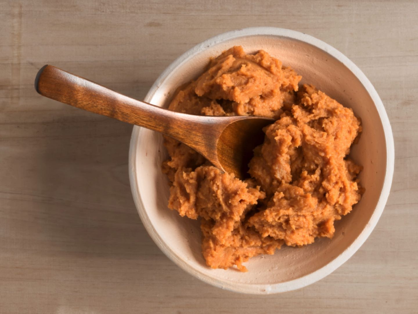 close up of a bowl of miso paste
